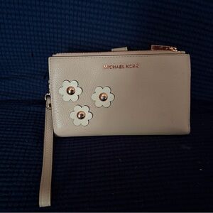 Michael Kors Tan Wristlet with Floral Embellishments